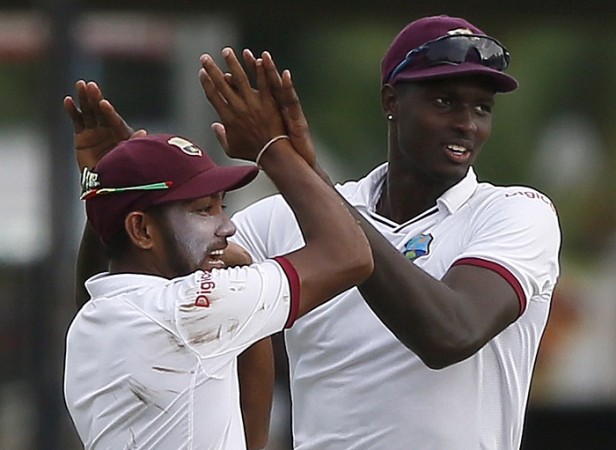 Devendra Bishoo and Jason Holder. Jason Holder Devendra Bishoo West Indies