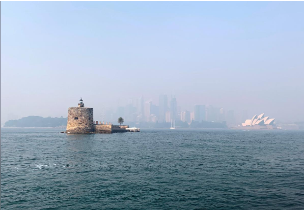 Fort Denison is seen as haze from the ongoing bushfires covers the city skyline and the Sydney Opera House in the background, in Sydney, Australia November 21, 2019. Reuters Fort Denison