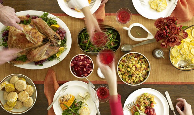 Thanksgiving spread on a family table. Thanksgiving is not just about food