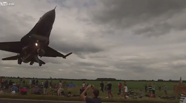 Spectators enjoying an air-show in Lincolnshire, were forced to dive for cover as a F16 fighter jet zipped through only about a meter away from their heads. Spectators enjoying an air-show in Lincolnshire, were forced to dive for cover as a F-16 fighter jet zipped through only about a meter away from their heads.