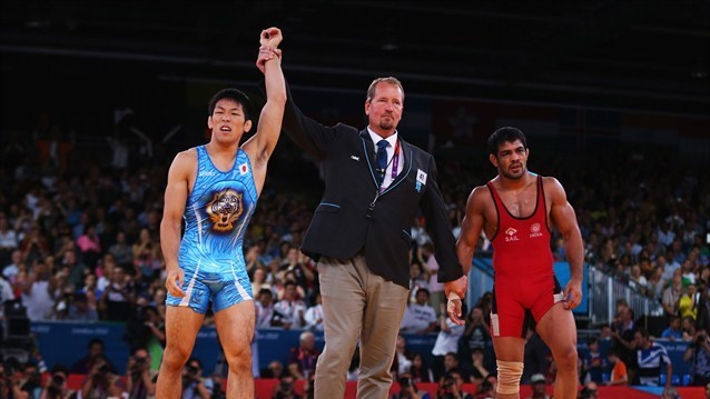 Tatsuhiro Yonemitsu of Japan celebrates his victory