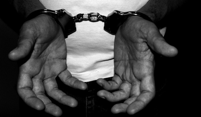 Representational Image. handcuffs, arrest, criminal