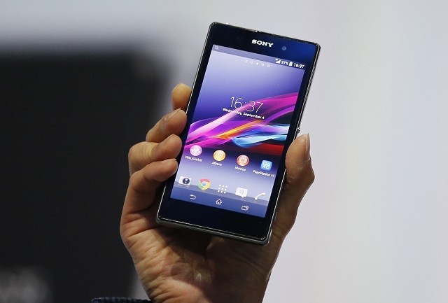 Sony Corp's President and Chief Executive Officer Kazuo Hirai presents a new Sony Xperia Z1 smartphone during it's world premier at the IFA consumer electronics fair in Berlin, September 4, 2013. Sony Xperia Z1 during it's world premier at the IFA consumer electronics fair, 2013