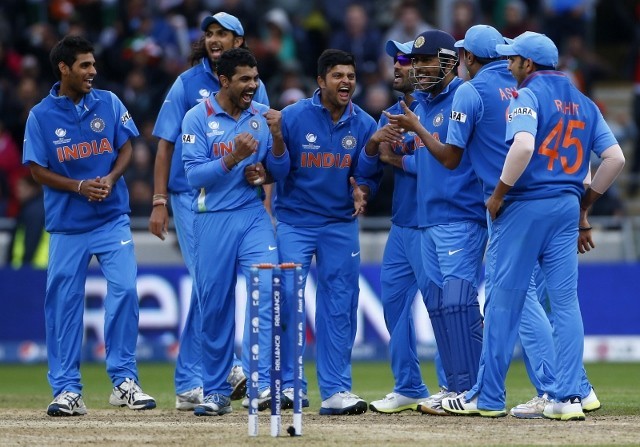 Indian players celebrate the wicket of England batsman Ian Bell in their ICC Champions Trophy 2013 final India