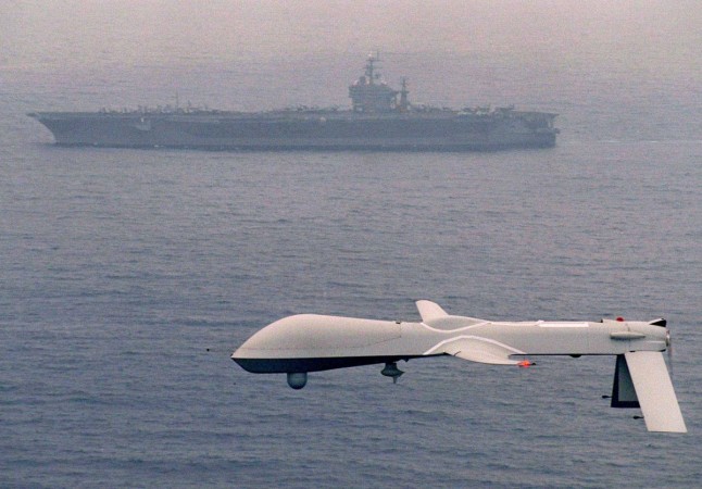 The Predator unmanned aerial vehicle flies above USS Carl Vinson in this December 5, 1995 file photo MQ-1 Predator