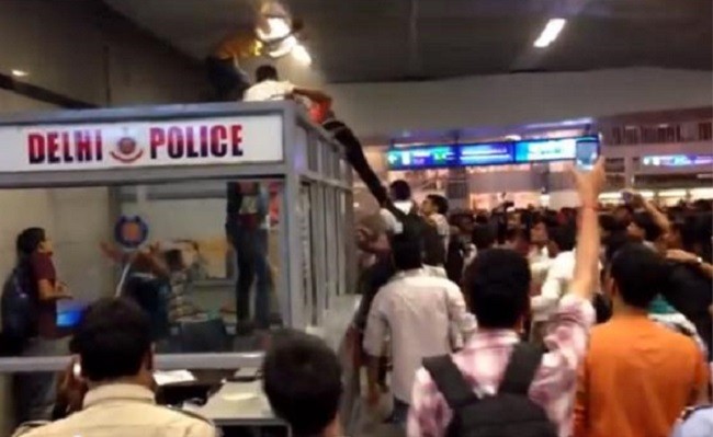 Three black students were attacked by a mob in Delhi Metro station.