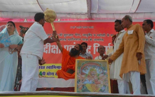 Baba Ramdev blessing one of his followers