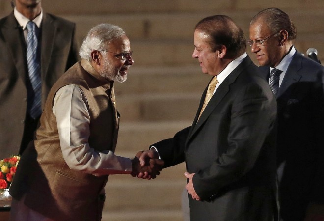 PM Modi greets his Pakistani counterpart Nawaz Sharif at his oath-taking ceremony on May 26, 2014. Sharif Modi
