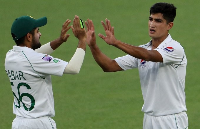 Naseem (R) celebrates the wicket of Marcus Harris Naseem Shah