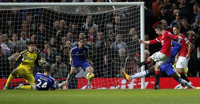 Manchester United striker Robin Van Persie scores the equaliser against Chelsea in their English Premier League game Robin Van Persie Manchester United Chelsea