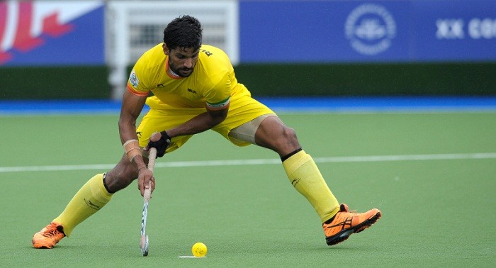 India's Rupinder Pal Singh takes a penalty stroke against New Zealand in the Glasgow Games. Rupinder Pal Singh Hockey