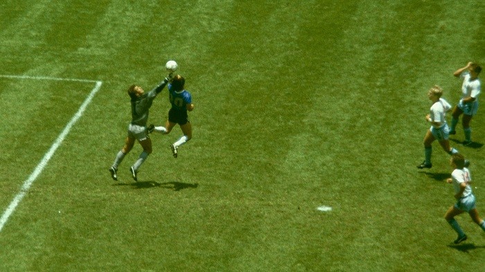 Diego Maradona scores the infamous Diego Maradona hand of God