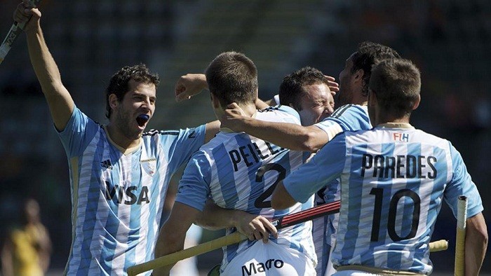 Argentina team celebrates after beating South Korea in the World Cup. Argentina Hockey team