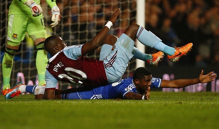 Chelsea striker Samuel Eto'o unsuccessfully appeals for a penalty following a challenge from West Ham defender Guy Demel. Reuters Guy Demel Samuel Eto'o West Ham Chelsea