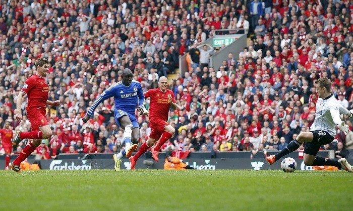 Chelsea's Demba Ba scores against Liverpool after Steven Gerrard's slip gave him a chance at goal. Ba Gerrard