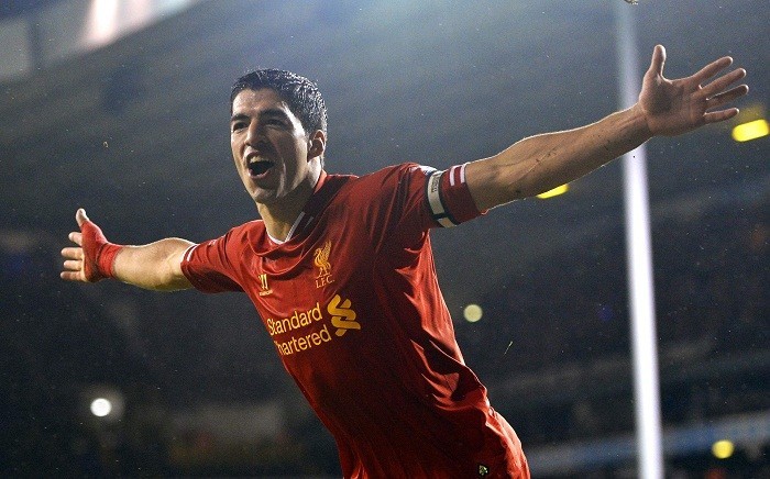 Liverpool forward Luis Suarez celebrates after scoring his second goal against Tottenham in the English Premier League, December 15. Reuters Luis Suarez Liverpool