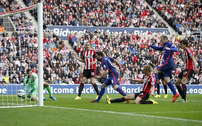 Manchester United playmaker Juan Mata scores against Sunderland in their English Premier League game Juan Mata Manchester United Sunderland