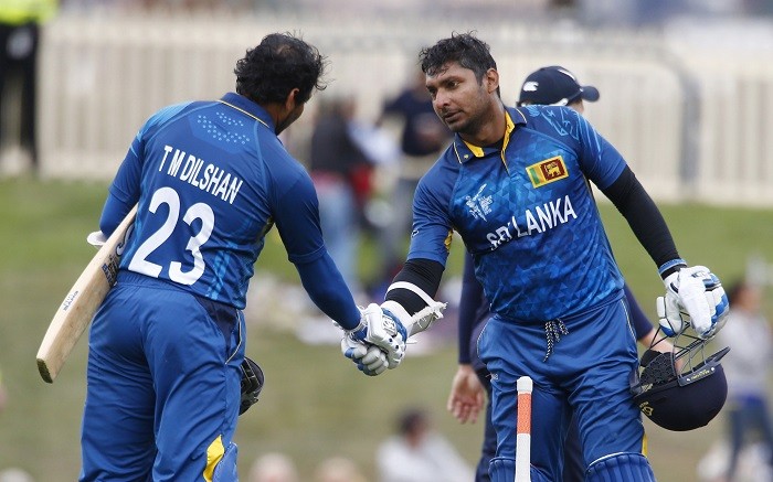 Sri Lanka opener Tillakaratne Dilshan congratulates teammate Kumar Sangakkara on completing a fourth consecutive ICC Cricket World Cup 2015 hundred Kumar Sangakkara Tillakaratne Dilshan Sri Lanka ICC Cricket World Cup 2015