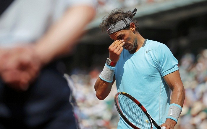 Rafael Nadal of Spain reacts during his match at the French Open. Rafael Nadal Sad