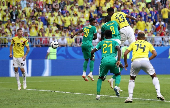 Yerry Mina (13) scores a headed goal for Colombia against Senegal Yerry Mina Colombia Senegal