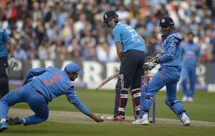 Suresh Raina completes a stunning catch to dismiss Ben Stokes in the 3rd ODI Suresh Raina MS Dhoni India Ben Stokes England