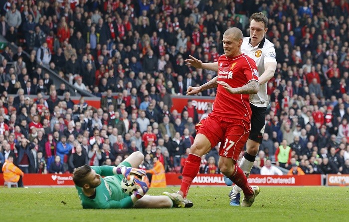 Liverpool's Martin Skrtel stamps on Manchester United's David De Gea during the two sides' Premier League clash at Anfield Martin Skrtel