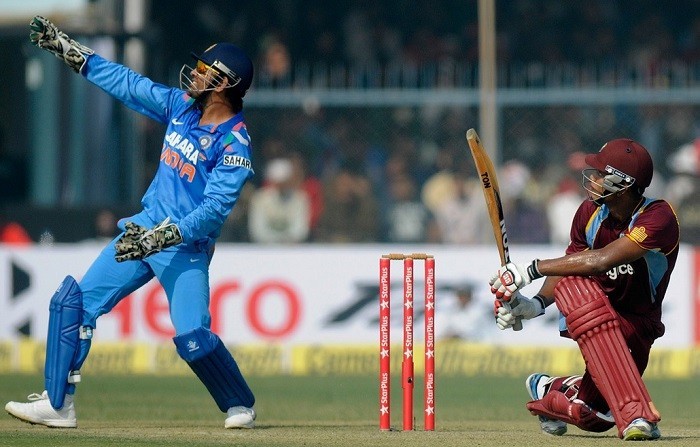 West Indies opener Kieran Powell plays the shot that led to his dismissal against India, November 27. BCCI Dhoni Powell India West Indies