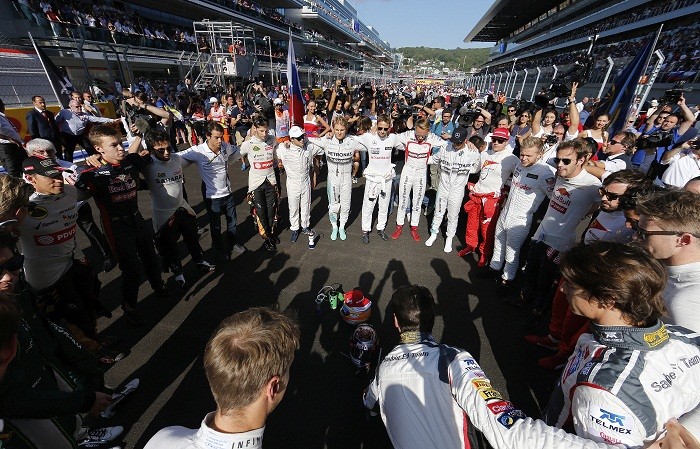 Formula One drivers pray for Jules Bianchi before the first Russian Grand Prix in Sochi Jules Bianchi F1 drivers tribute Russian GP