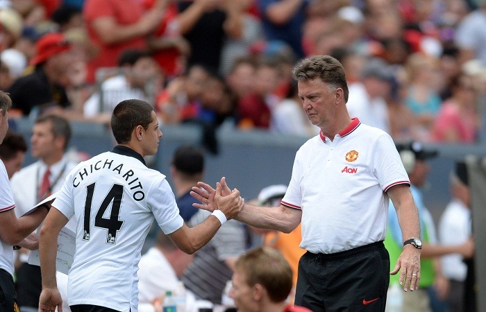 Manchester United manager Louis Van Gaal and Javier Hernandez shake hands during their preseason friendly against Roma Louis Van Gaal Javier Hernandez Manchester United