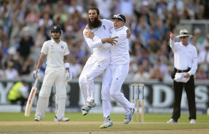 England spinner Moeen Ali celebrates with teammate Joe Root after dismissing India No.3 Cheteshwar Pujara during Day 3 of the fourth Test Moeen Ali Joe Root England