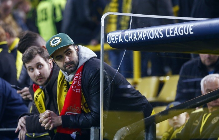 Fans wait inside the Borussia Dortmund stadium, April 11, 2017 Borussia Dortmund, fans, team bus, explosions, Champions League