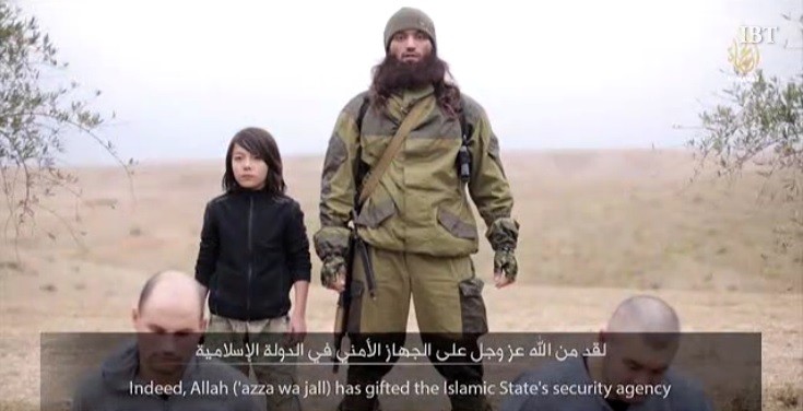 ISIS propaganda video shows a child soldier shooting dead two Russian Spies. ISIS prpaganda video shows a child soldier shooting dead two Russian Spies