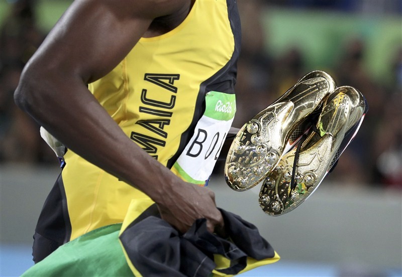 Usain Bolt Makes History With A Triple Triple As Jamaica Wins Sprint Relay Photos Images