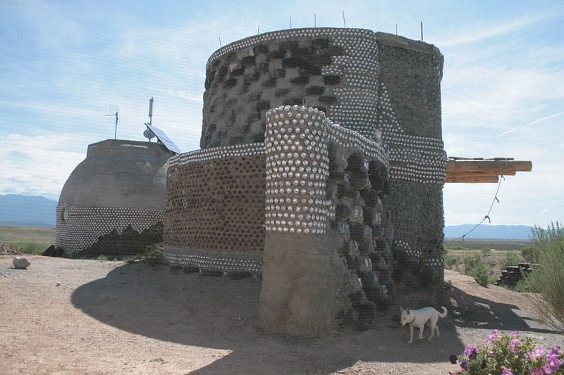 Earthship constructs on tyres, bottles and brickwalls. Earthship