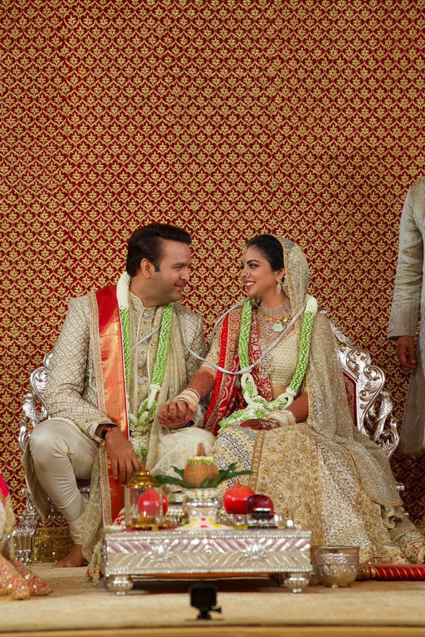 Isha Ambani and Anand Piramal look content on their