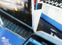 a-customer-looks-at-nokia-phones-at-a-showroom-run-by-softlogic-in-colombo