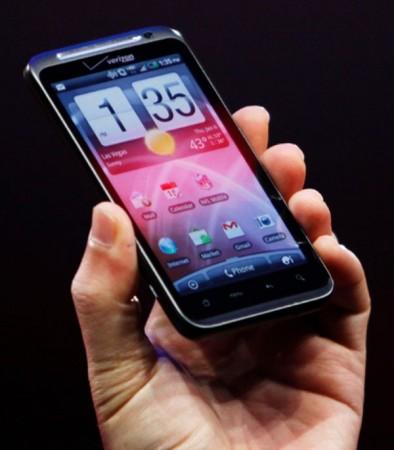 HTC CEO Peter Chou holds up a HTC "Thunderbolt" 4G Verizon smartphone as he speaks at the Verizon news conference on the opening day of the Consumer Electronics Show (CES) in Las Vegas January 6, 2011