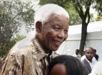 handout-picture-of-former-south-african-president-nelson-mandela-hugging-his-great-granddaughter-zenani-mandela-in-diepkloof-soweto