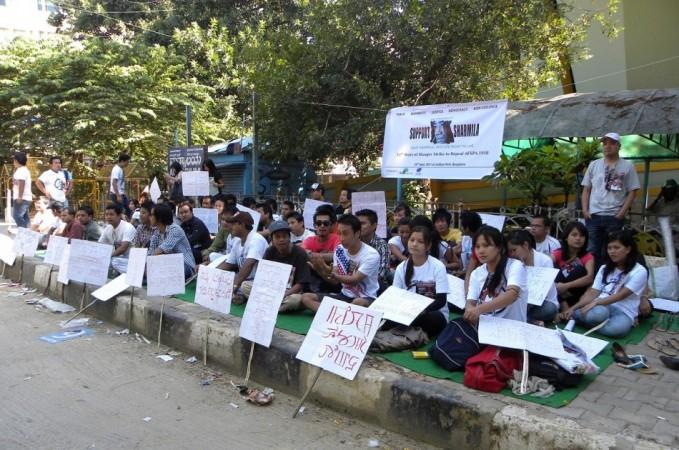Participants participate in the sit-in-protest in support of Irom Sharmila Chanu, who is undergoing a fast unto death against the imposition of Arm Forces Special Power Act-1985 in Manipur and other parts of North Eastern parts of India.. Irom Sharmila Chanu
