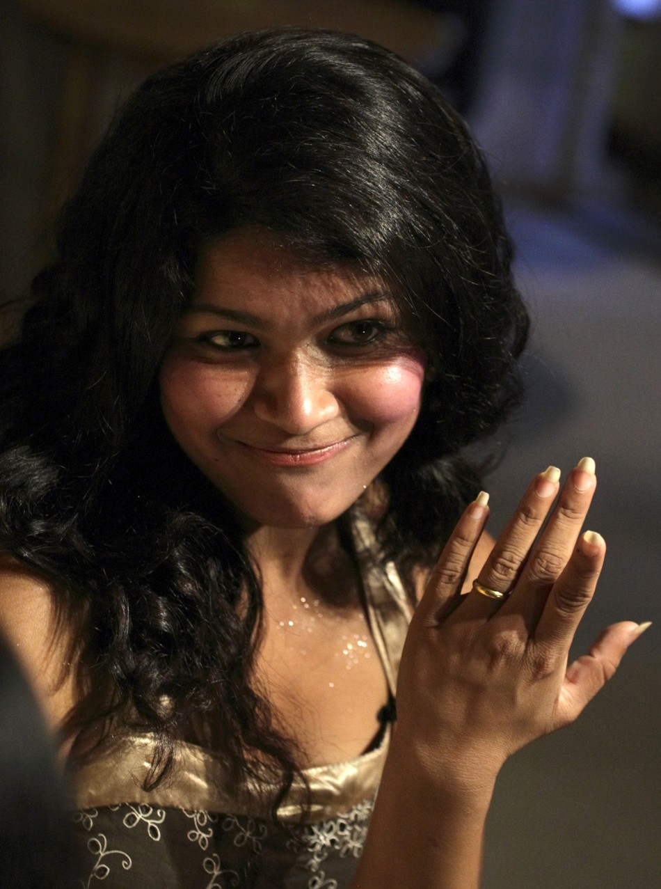 Nihita Biswas Sobhraj shows her engagement ring to the media in Kathmandu July 5, 2008. Nihita Biswas Sobhraj