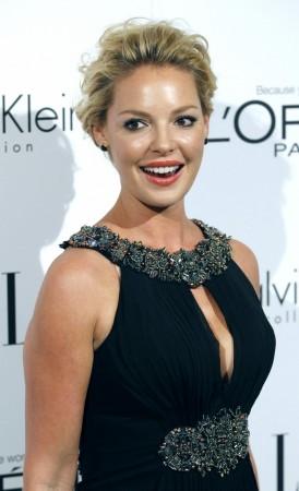 Heigl poses at Elle's 18th Annual Women in Hollywood Tribute in Los Angeles wearing a slimming black dress with jewel encrusted neck and belt line. Katherine Heigl