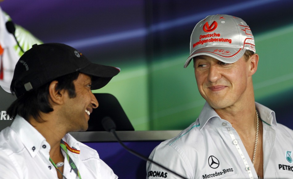 Narain Karthikeyan with Michael Schumacher