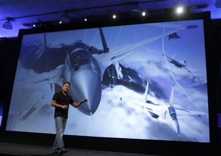 NVIDIA President and CEO Jen-Hsun Huang gives a demonstration during his keynote address at the GPU Technology Conference in San Jose