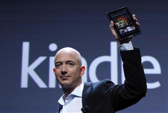 Amazon CEO Jeff Bezos holds up the new Kindle Fire Amazon Kindle Fire