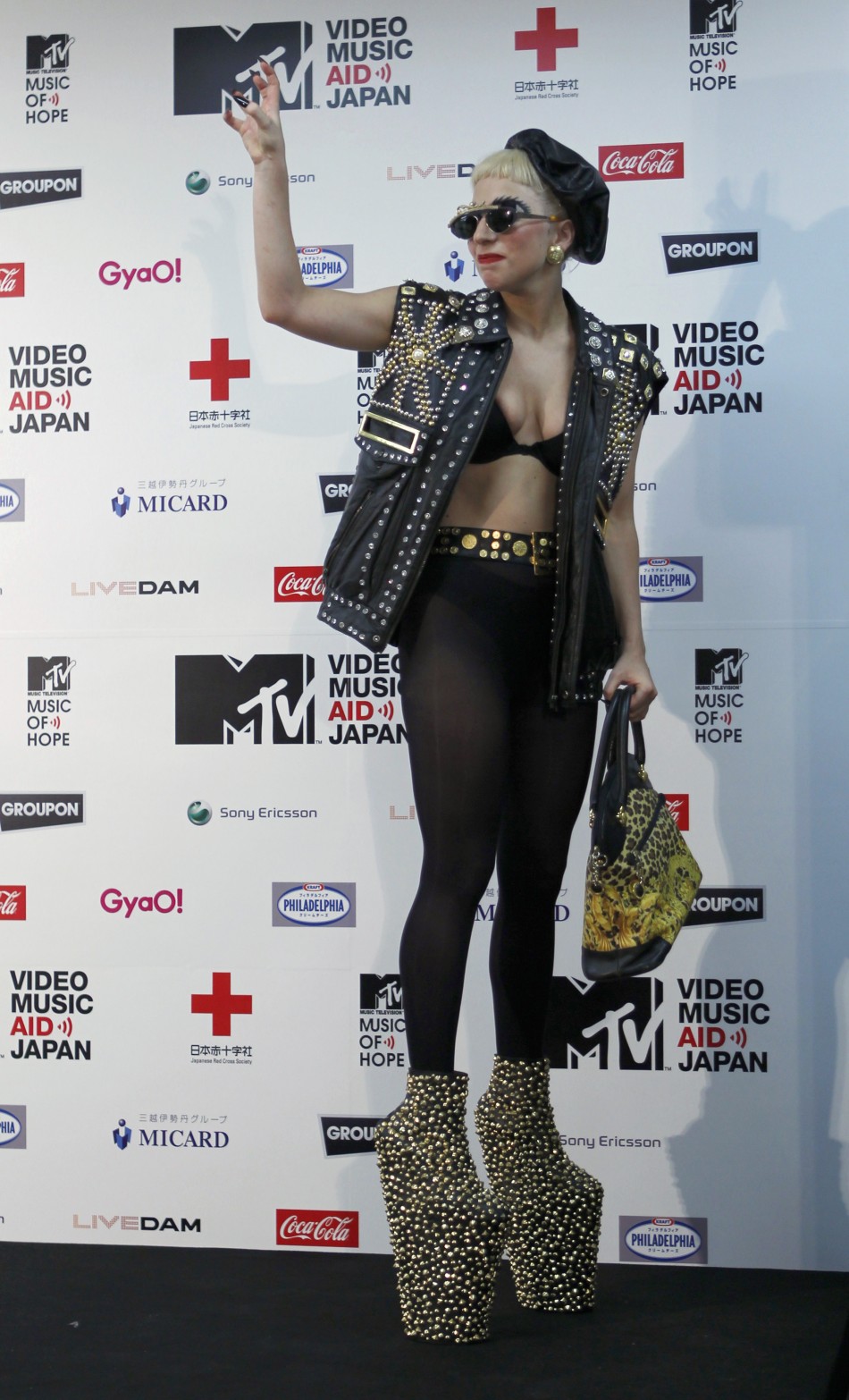 Lady Gaga wore a pair of towering heels to perform at MTV Video Music Aid Japan in the city of Chiba, near Tokyo. The event was held to help those affected by the earthquake and tsunami that struck the country. Lady Gaga