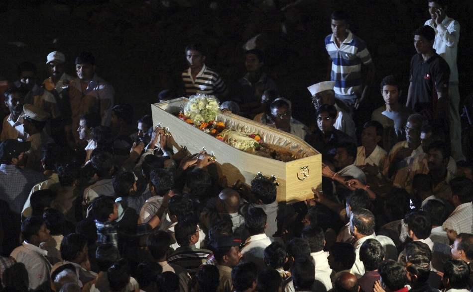 Relatives carry the body of Anuj Bidve outside his house during his funeral in Pune, about 190km (118 miles) from Mumbai, January 7, 2012.  Anuj Bidve