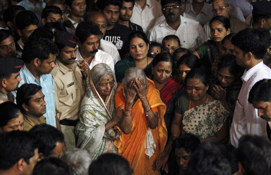 A relative of murdered Indian student Anuj Bidve reacts after seeing his body during his funeral in Pune, about 190km (118 miles) from Mumbai, January 7, 2012. Anuj Bidve