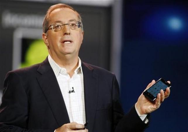 Paul Otellini, CEO of Intel Corp. (Nasdaq: INTC) holds an Intel smartphone.