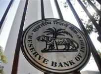 The Reserve Bank of India logo is pictured outside its head office in Mumbai