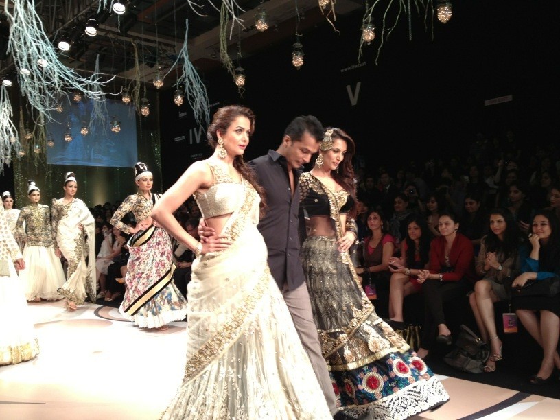 Actress Amrita Arora (L) Malika Arora Khan (R) with showstopper mania at the opening day of the Lakme Fashion Week Summer/ Resort LFW Summer/ Resort- 2012